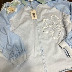 Light Blue Long Sleeve Top with Floral Design